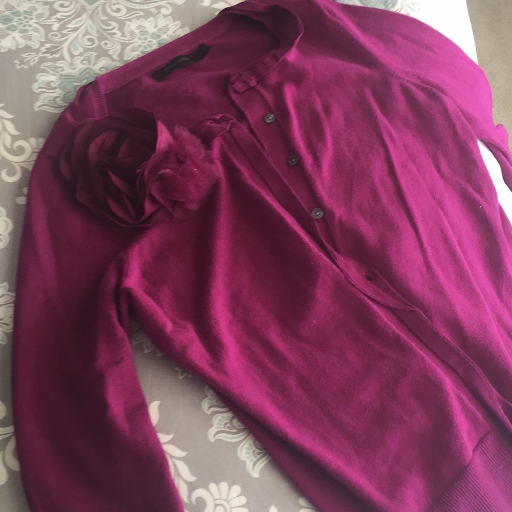 Maroon sweater with flower detail